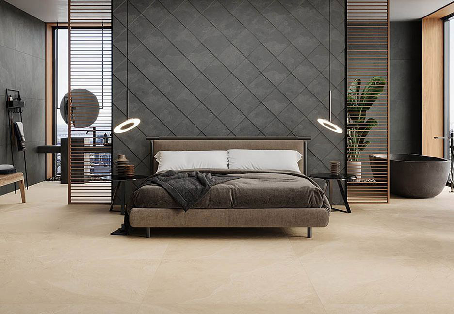 Спальня в темных тонах с большой кроватью