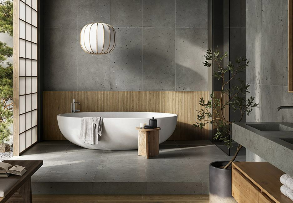 Минималистичная ванная с серой плиткой и ванной