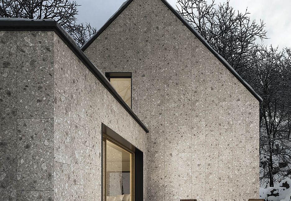 Интерьер дома с каменной стеной и окном.